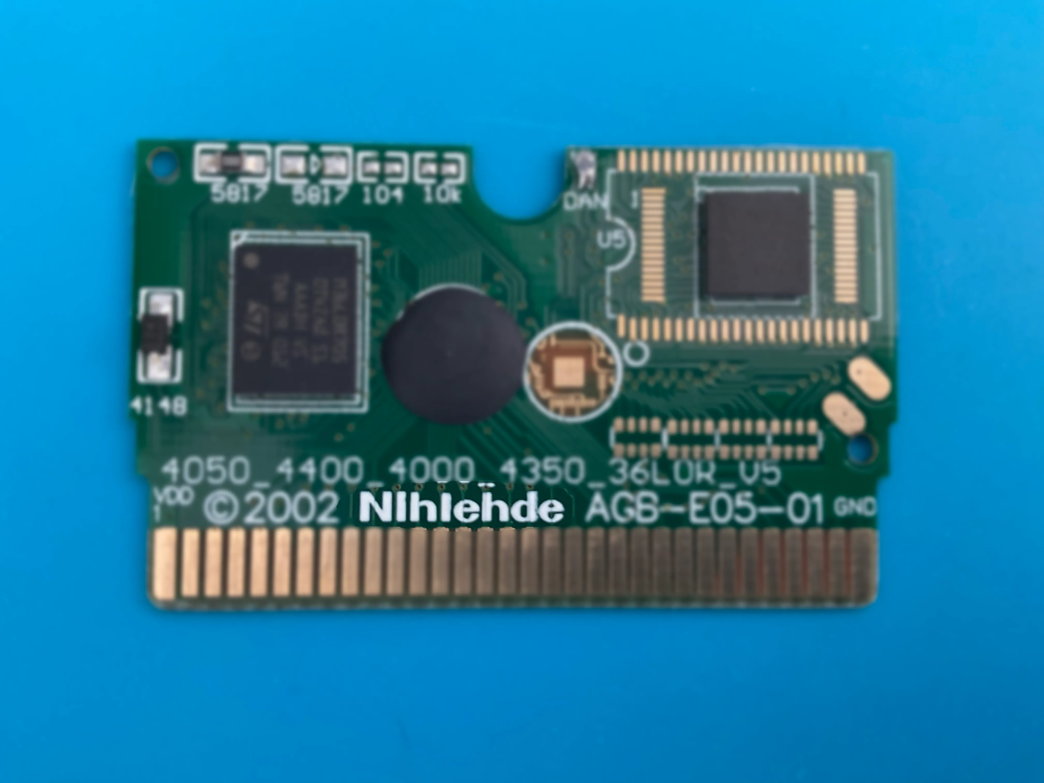 Misspelled Nintendo text on a fake PCB